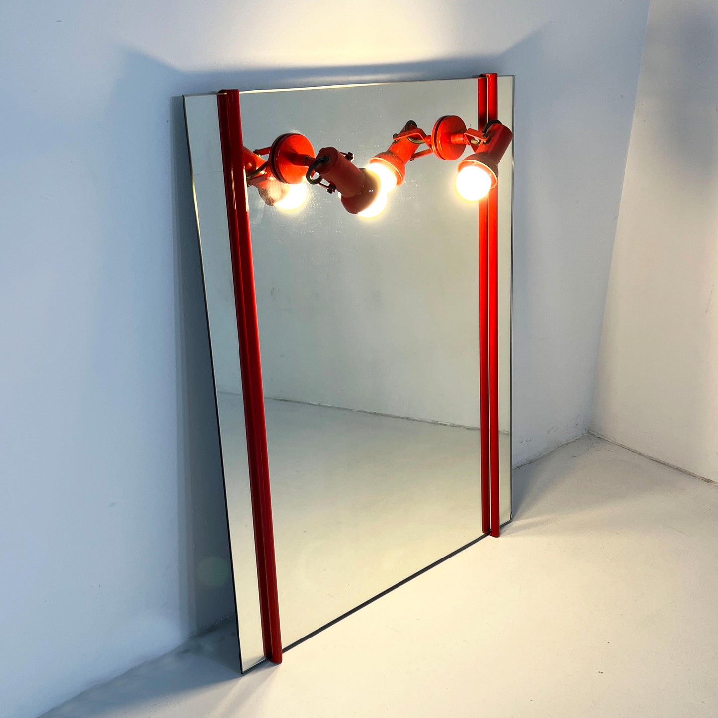 Red metal mirror with adjustable lamps, 1970s vintage