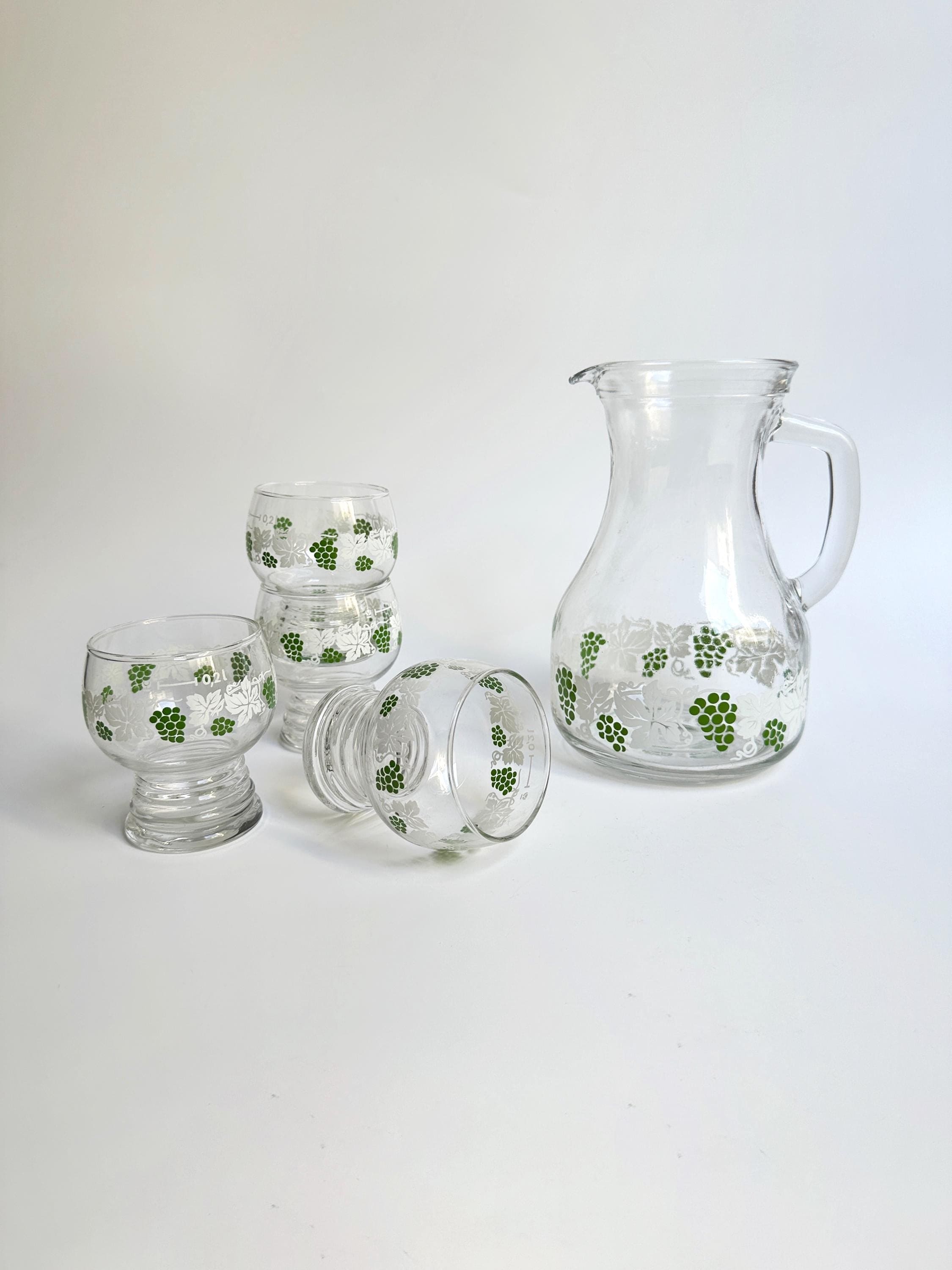 Vintage drinking glasses with matching 2024 pitcher