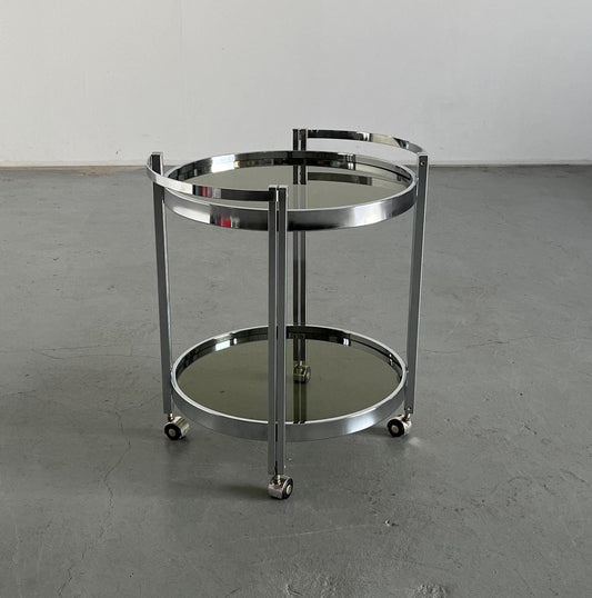 Round Italian Mid-Century Modern serving trolley or bar cart in chrome-plated metal and smoked glass, Italy 1970s