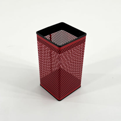 Red perforated trash can