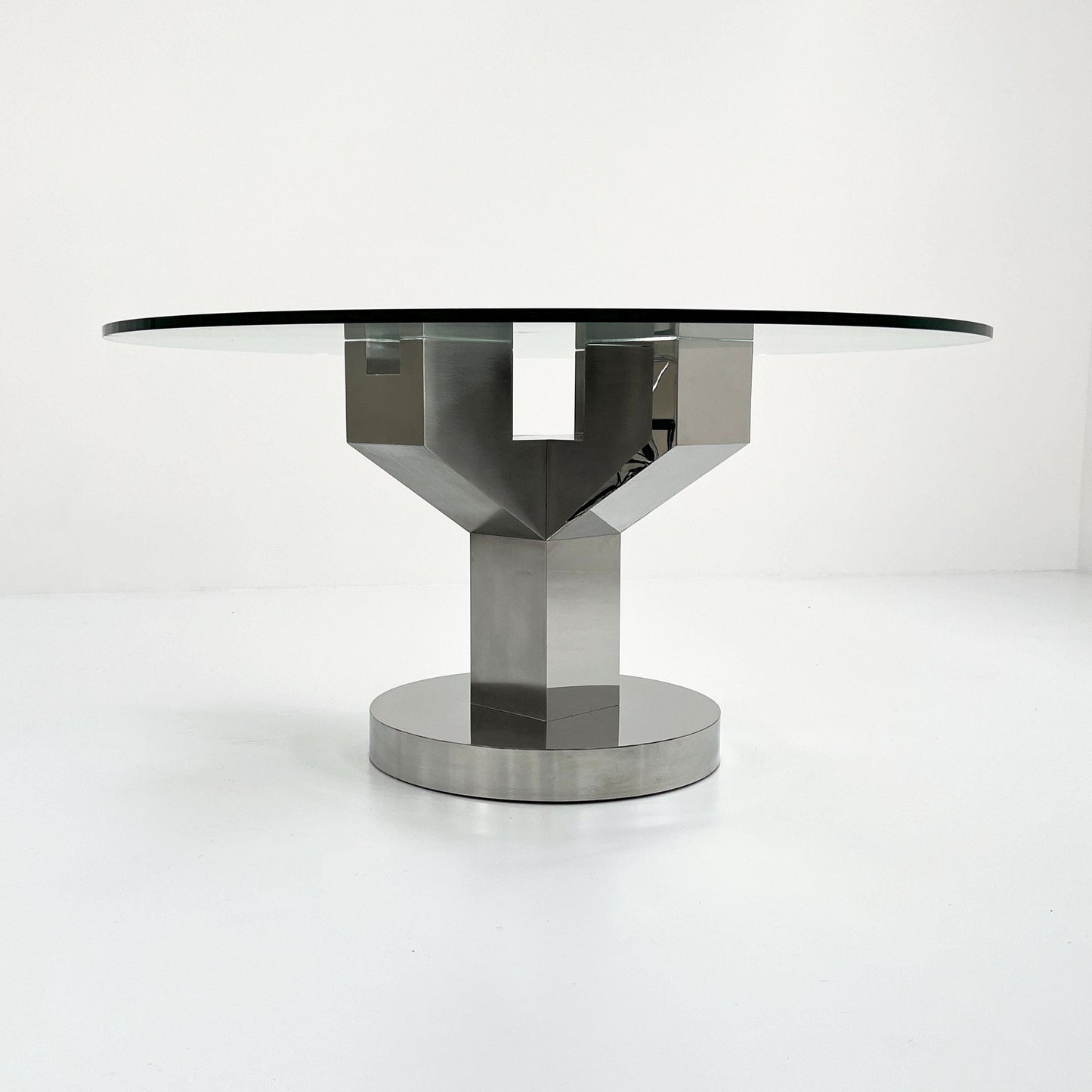 Structural dining table with chrome legs and glass top, 1970s vintage