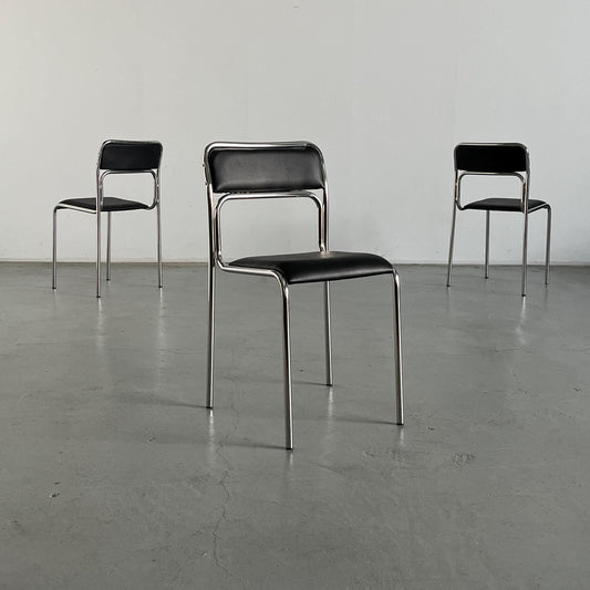 Bauhaus dining chairs in chrome steel and black imitation leather, Italy, 1990s