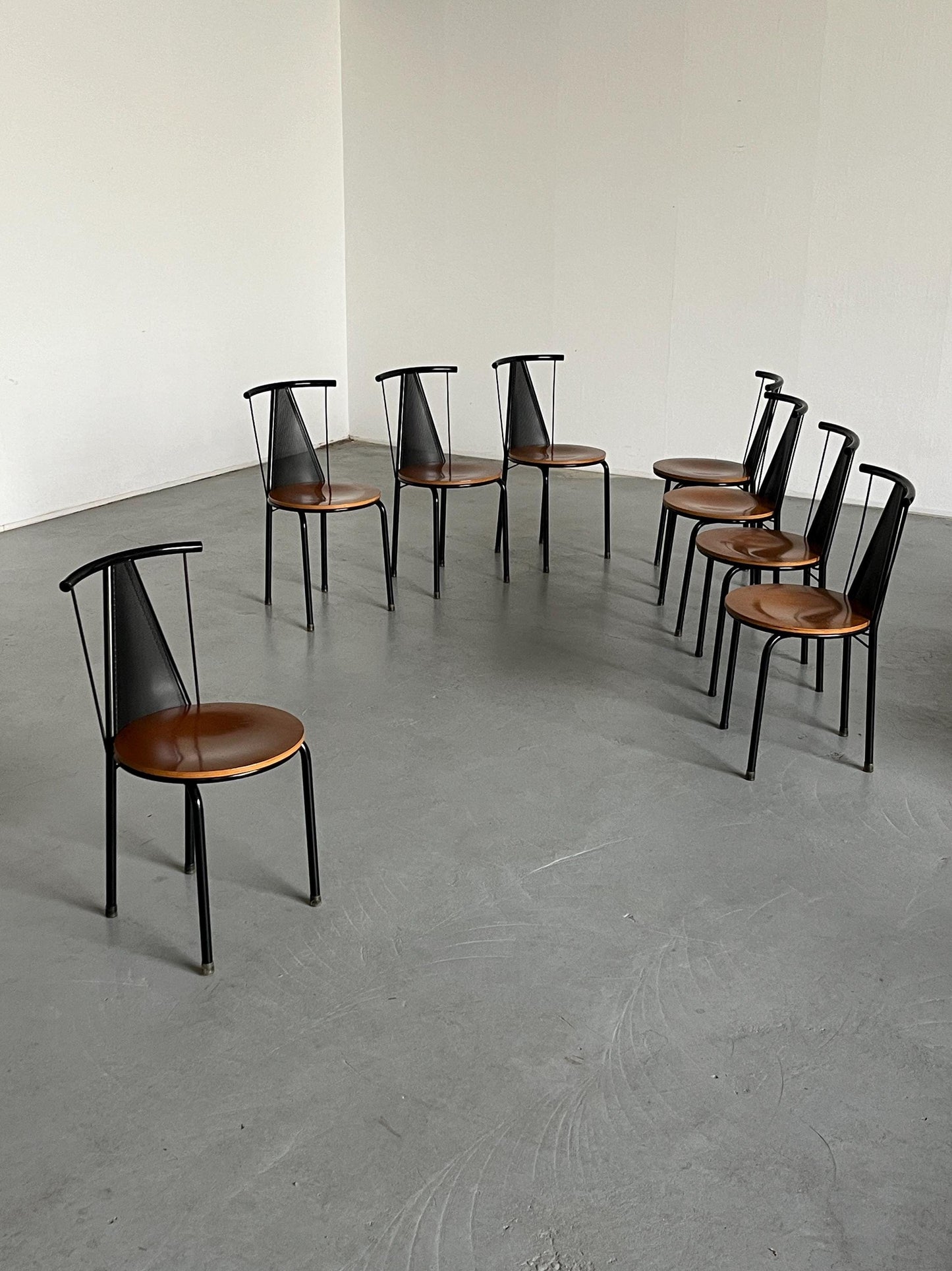 1 of 8 Postmodern Sculptural Vintage Dining Chairs in Black Metal with Round Wooden Seats, 1980s Italy