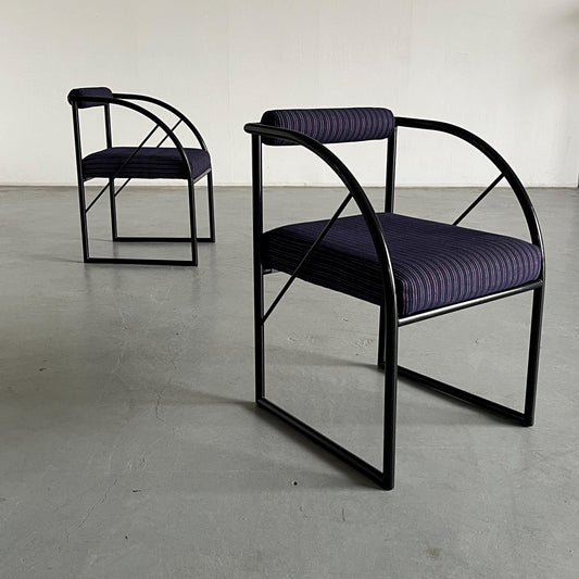 Set of 2 postmodern armchairs in the style of Mario Botta, multicolored Memphis stripe upholstery and black tubular steel, 1980 Italy