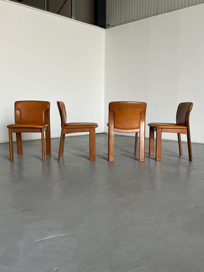 Set of 4 Vintage Mid-Century Modern Dining Chairs, Cognac Leather and Wood, in the style of Silvio Coppola, 1970s Italy