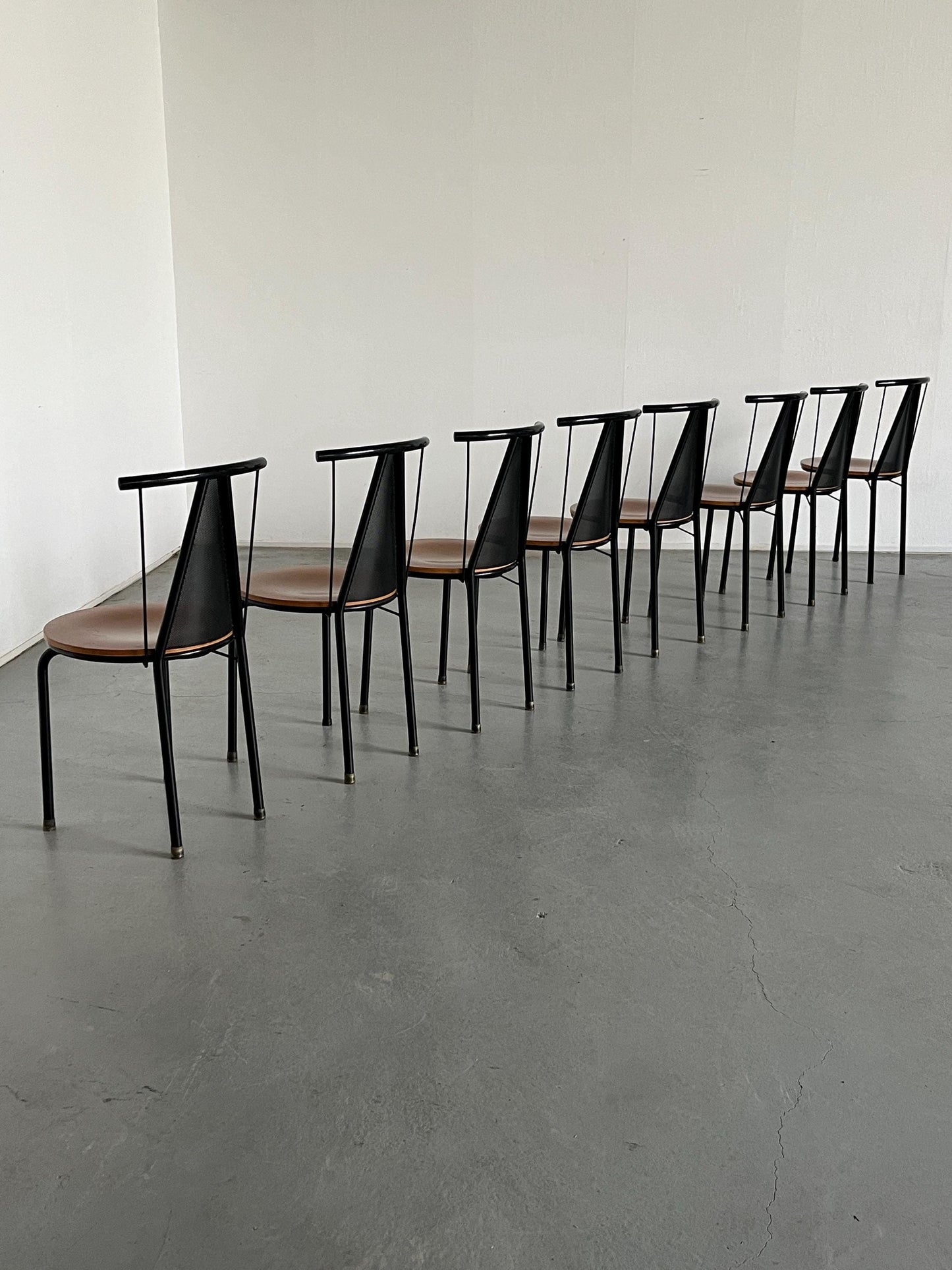 1 of 8 Postmodern Sculptural Vintage Dining Chairs in Black Metal with Round Wooden Seats, 1980s Italy