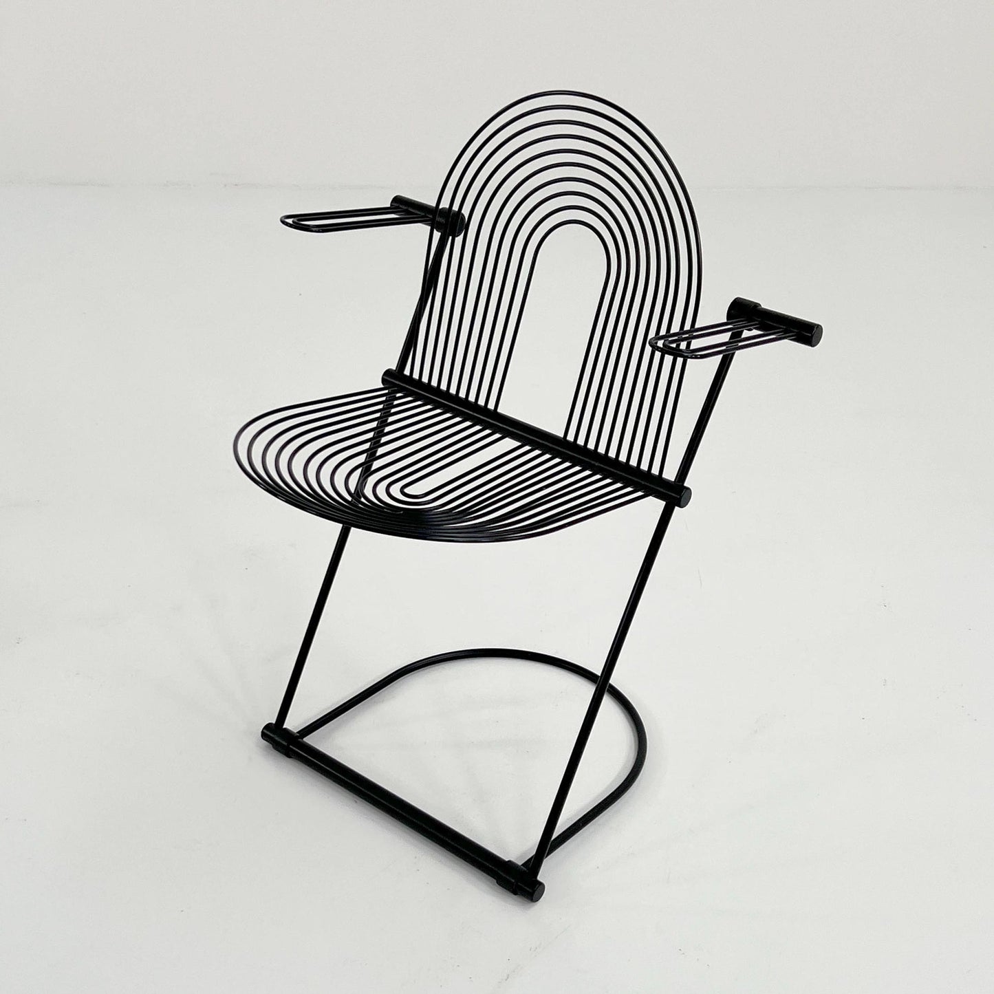 Vintage rocking chair with armrests by Jutta and Herbert Ohl for Rosenthal Lübke, 1980s.