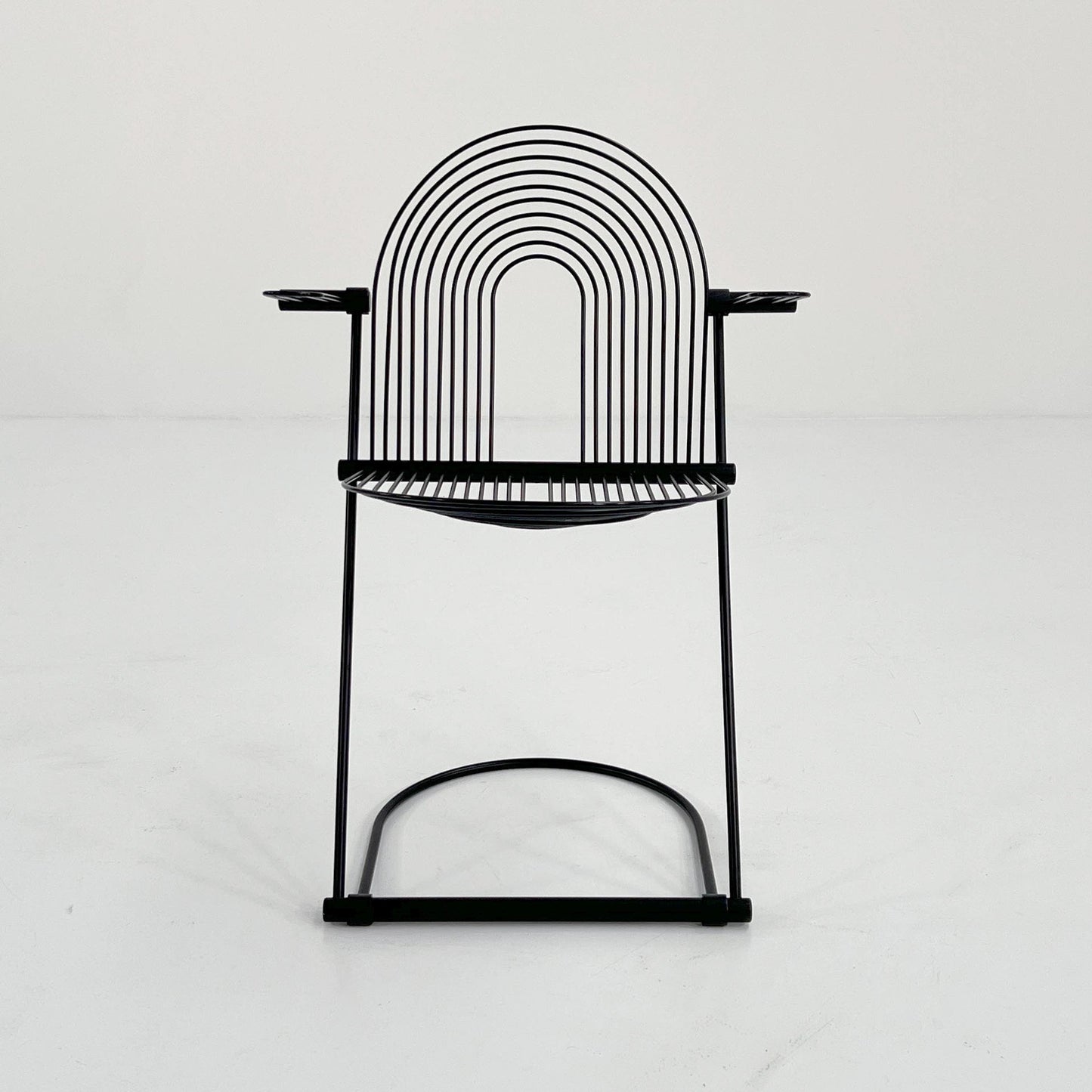 Vintage rocking chair with armrests by Jutta and Herbert Ohl for Rosenthal Lübke, 1980s.