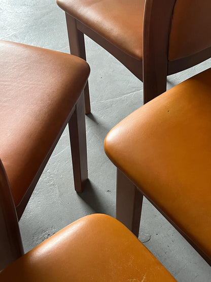 Set of 4 Vintage Mid-Century Modern Dining Chairs, Cognac Leather and Wood, in the style of Silvio Coppola, 1970s Italy