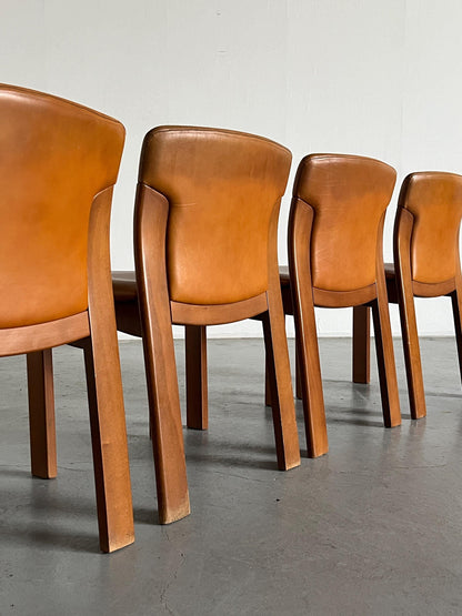 Set of 4 Vintage Mid-Century Modern Dining Chairs, Cognac Leather and Wood, in the style of Silvio Coppola, 1970s Italy