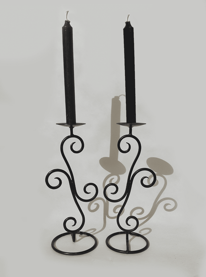 Spiral-shaped vintage wrought iron candle holder pair