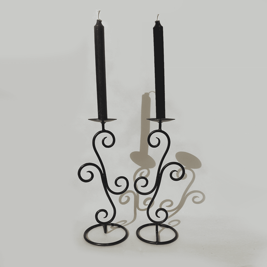 Spiral-shaped vintage wrought iron candle holder pair