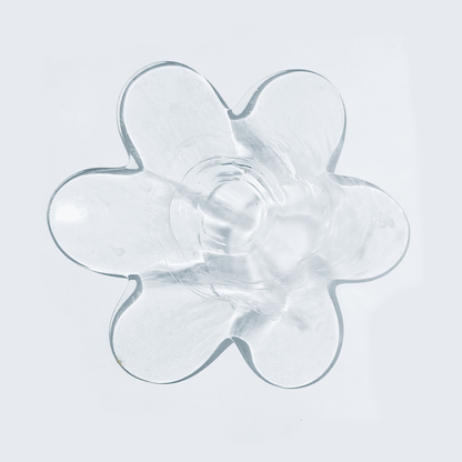 Transparent vintage glass bowl in flower shape