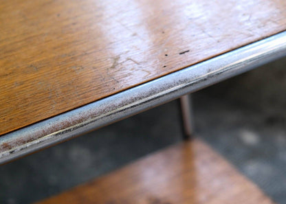 Tubular steel side table with veneered wooden shelves