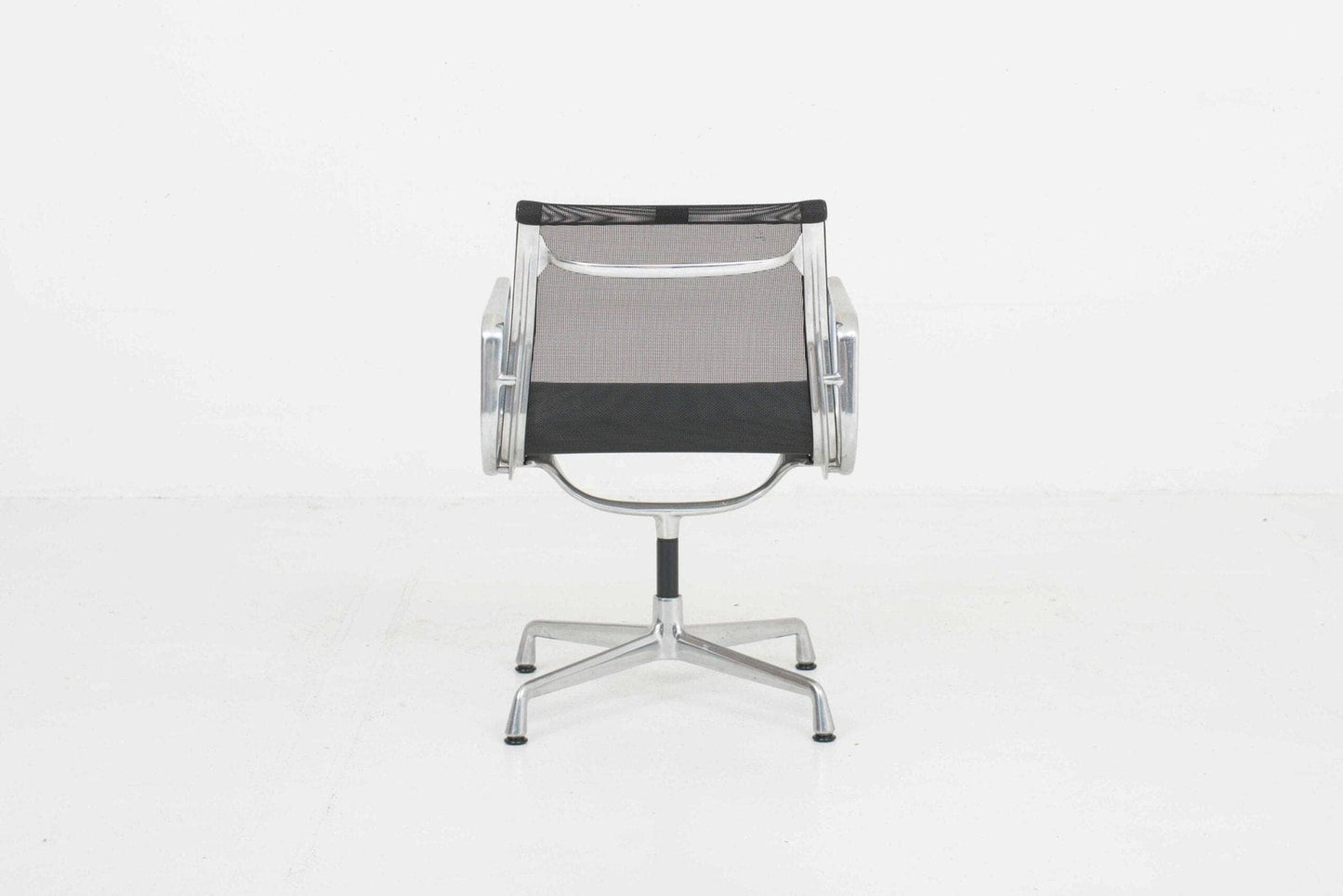 Eames EA 108 office chair by Vitra with black mesh and polished aluminum Vintage