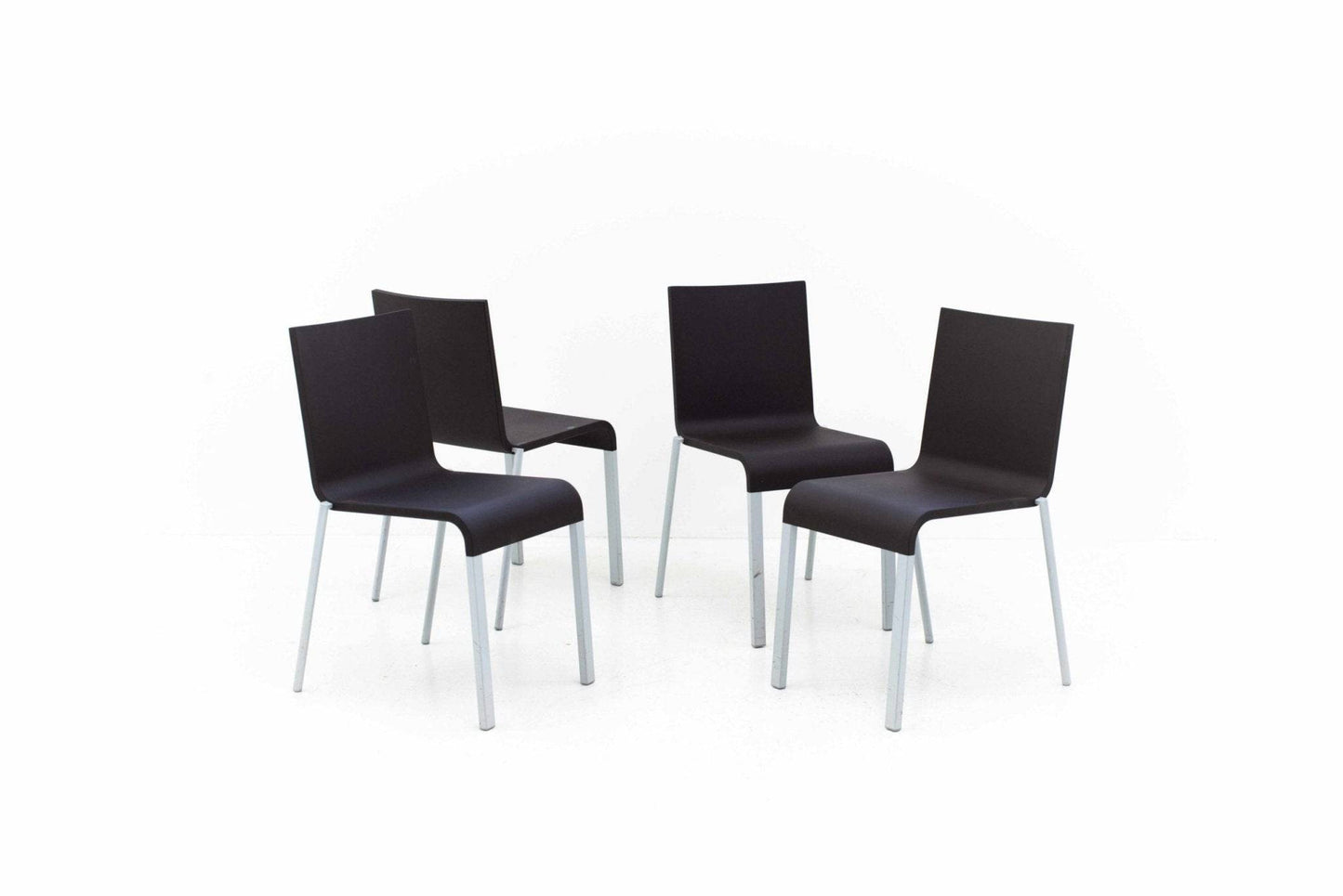 Maarten Van Severen .03 chairs from Vitra in dark brown