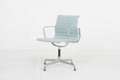 Vitra EA 104 Dinechair by Charles and Ray Eames in light blue hopsack and polished aluminum Vintage